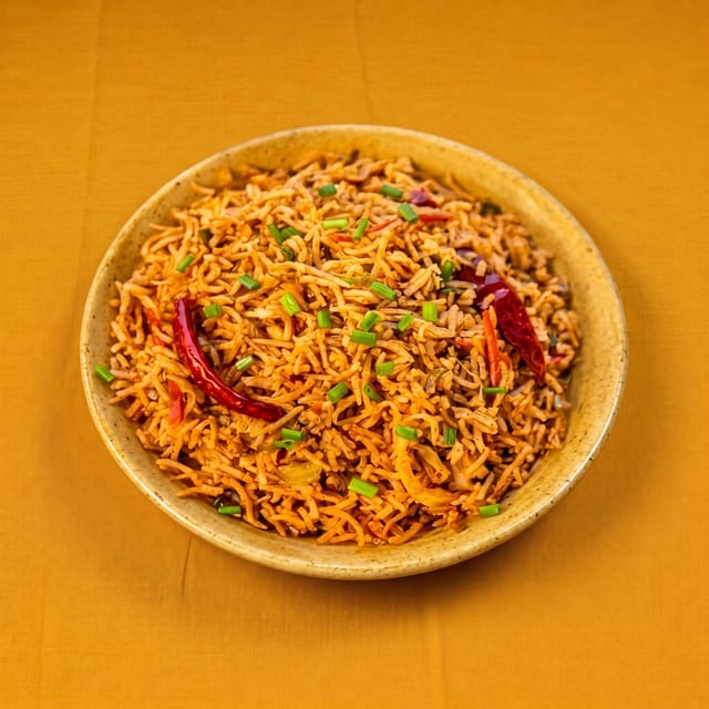Triple Schezwan Fried Rice.