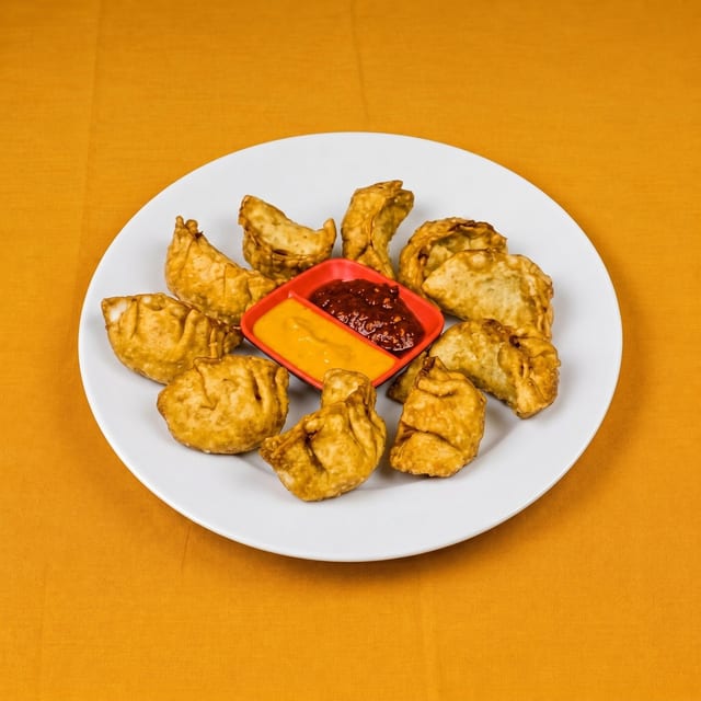Deep Fried Paneer Momos.